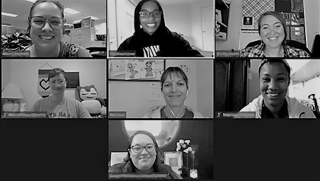 Teachers smiling for the camera in a zoom meeting
